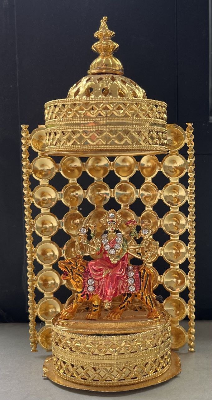 Deity in pavilion