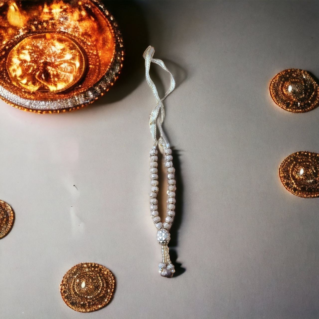 Deity garland - golden pearls 10 cm